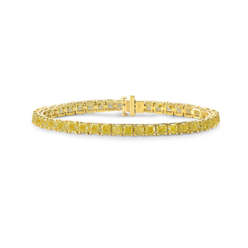 Fancy yellow diamond bracelet. Cushion diamond bracelet. Cushion tennis bracelet. Yellow diamond jewelry. Yellow tennis bracelet. Natural yellow diamonds.