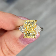 4 carat fancy yellow diamond ring. Gia certified fancy yellow diamond. Radiant cut yellow diamond. Yellow diamond engagement ring. Yellow diamond 3-stone ring. Canary diamond ring.