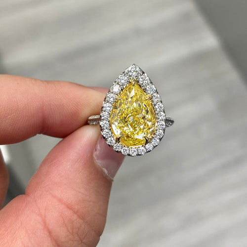 5 carat yellow diamond ring. Fancy intense yellow diamond ring. Yellow diamond radiant ring. Yellow diamond engagement ring. Canary yellow diamond ring.