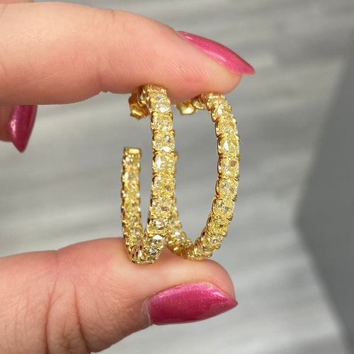 Old money fancy yellow diamond hoop earrings.