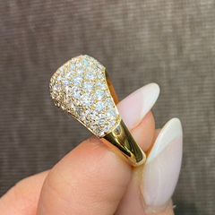 Elongated yellow diamond surrounded by white diamonds ring