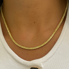Natural intense yellow diamond tennis necklace with cushion cut diamonds set in 18k yellow gold.