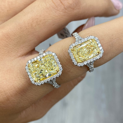 Elongated yellow diamond ring with white diamonds