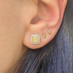 Fancy Light Yellow Cushion Diamond Studs 1.42 carat total center diamonds Center diamonds are 0.71ct each Surrounded by 0.22 Carats of White Radiant Diamonds Set in 18k Gold Handmade in NYC