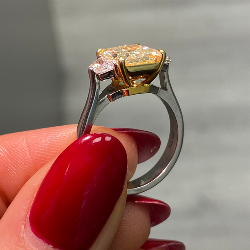 Fancy yellow engagement ring, three stone diamond ring, yellow diamond ring, yellow radiant diamond.