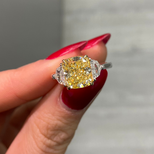 3 Carat Fancy Yellow VVS1 Cushion Diamond 3 Stone Ring, unique engagement ring style.