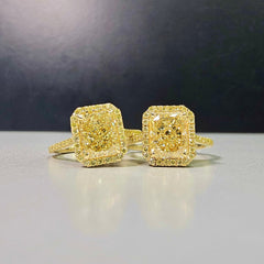 2.28 Carat Center Diamond GIA Light Yellow Diamond (Y-Z) Radiant Cut Diamond 0.30 Carats of Fancy Yellow Rounds VS1 Clarity Medium Blue Fluorescence Excellent, Very Good cutting Set in 18k Yellow Gold GIA Certified Diamond Handmade in NYC