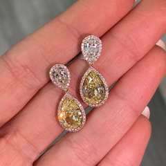 Fancy yellow diamond pear shape earrings. yellow diamond drop earrings. diamond earrings.