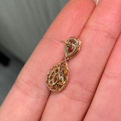 Fancy yellow diamond pear shape earrings. yellow diamond drop earrings. diamond earrings.