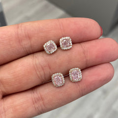 Pink diamond earrings. pink diamond studs. light pink diamonds. light pink cushions. diamond earrings.