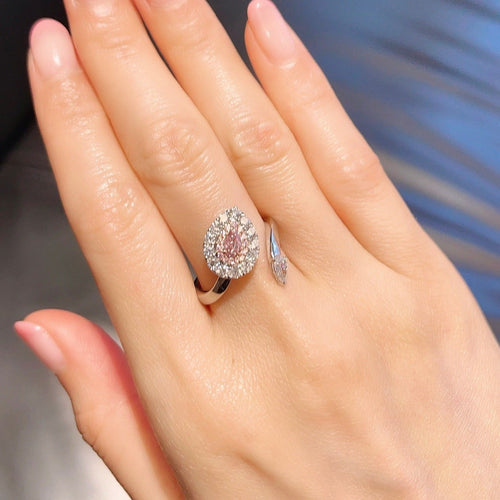 pink diamond ring. pink pear shape diamond