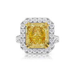 Elegant light yellow diamond engagement ring featuring a radiant cut with VS1 clarity.