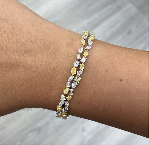 Fancy intense yellow diamond bracelet. Yellow diamond multi shape bracelet. Yellow diamond tennis bracelet. Canary diamond bracelet. Yellow diamond mutl shape. Natural yellow diamond bracelet