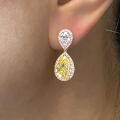 ar shape earrings. yellow diamond drop earrings. diamond earrings.
