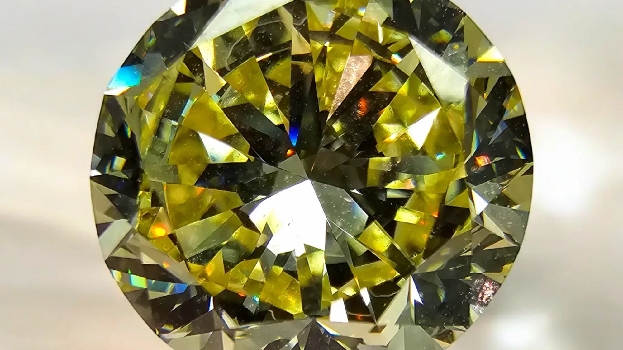 round fancy yellow diamond