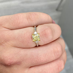 yellow diamond ring. yellow cushion cut diamond