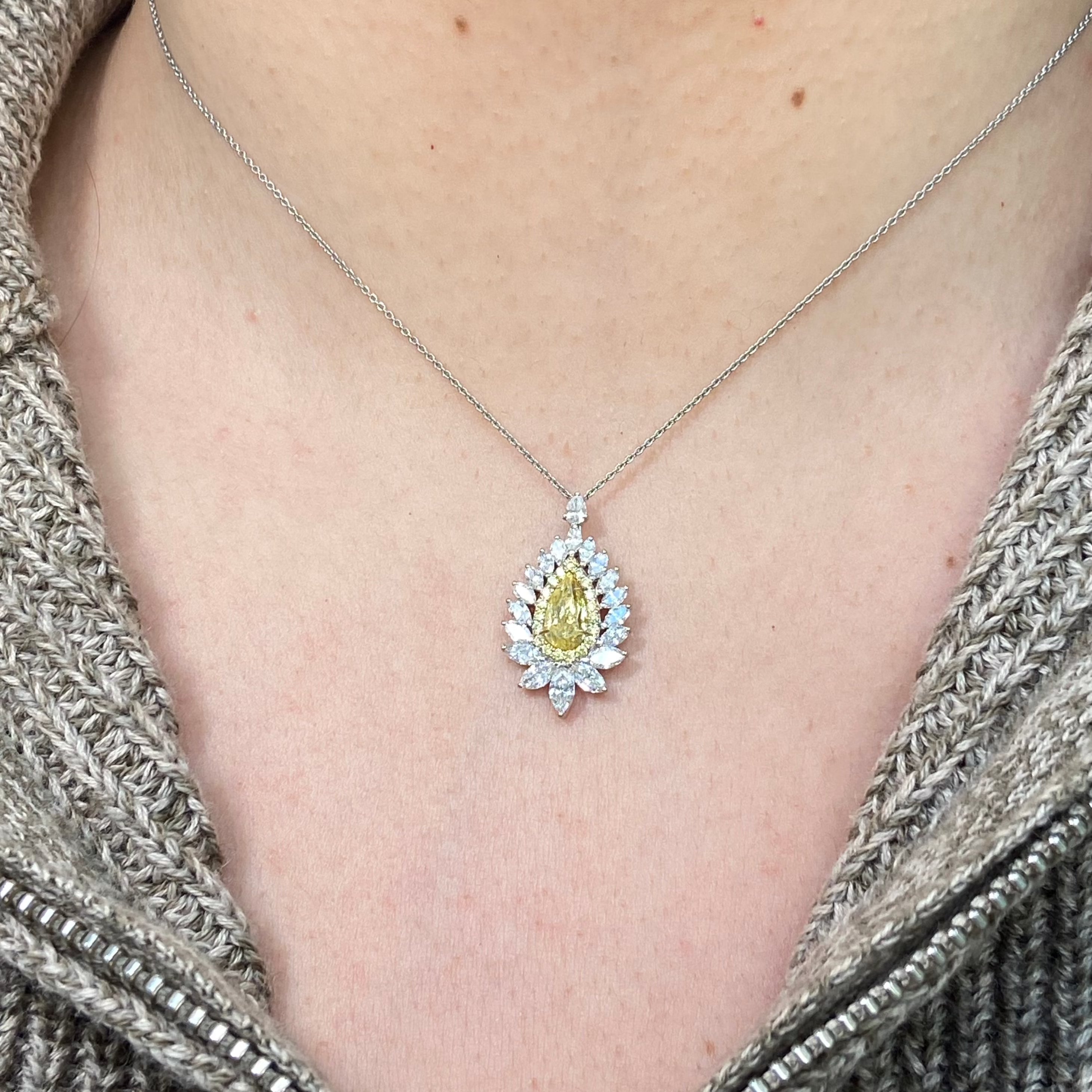 Intense yellow pear shape. Gia certified intense yellow diamond. Yellow diamond necklace. Unique yellow diamond necklace. Yellow diamond pear shape necklace.