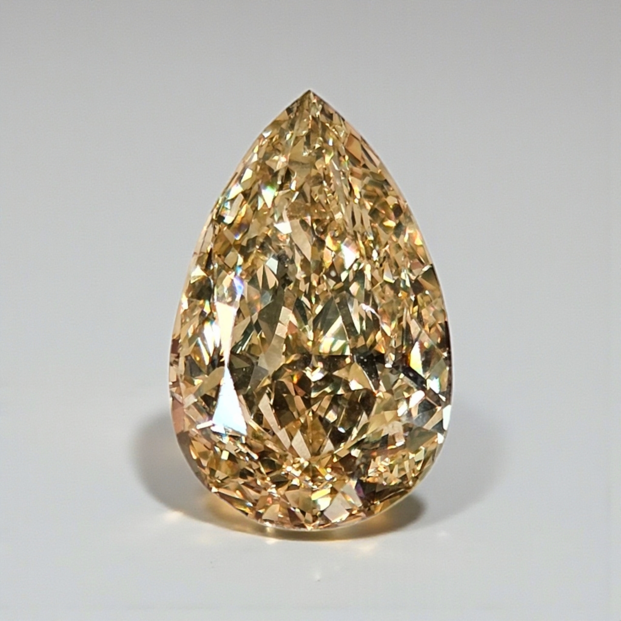 5.02ct Champagne Pear loose stone — color diamond specialists Rare Colors by Namdar