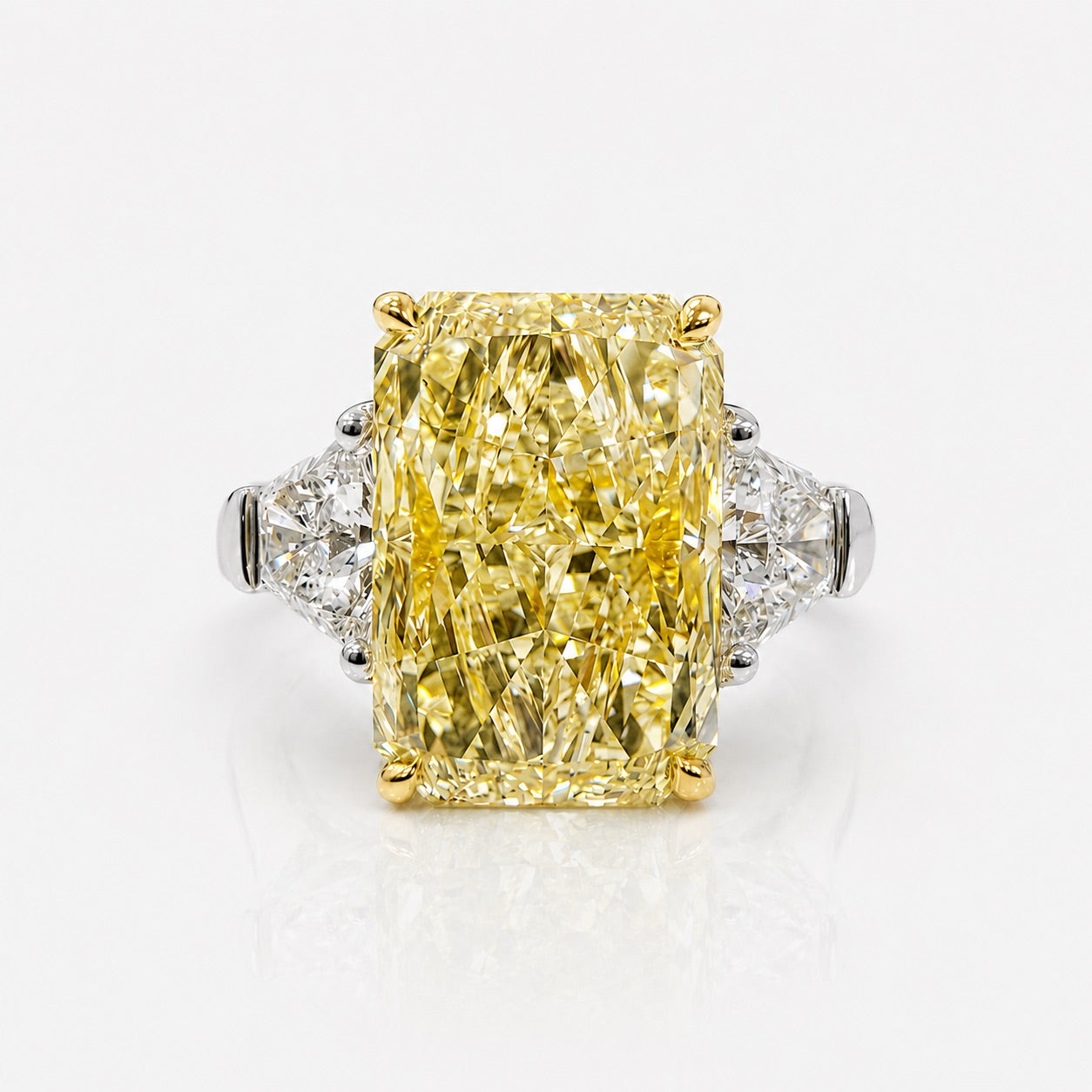 4.15ct GIA Fancy Yellow Elongated Radiant Diamond Three Stone Engagement Ring