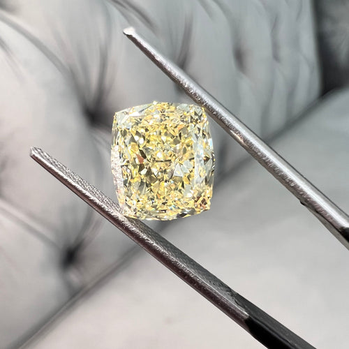 Fancy light yellow cushion diamond. Yellow diamond cushion cut. fancy light yellow GIA