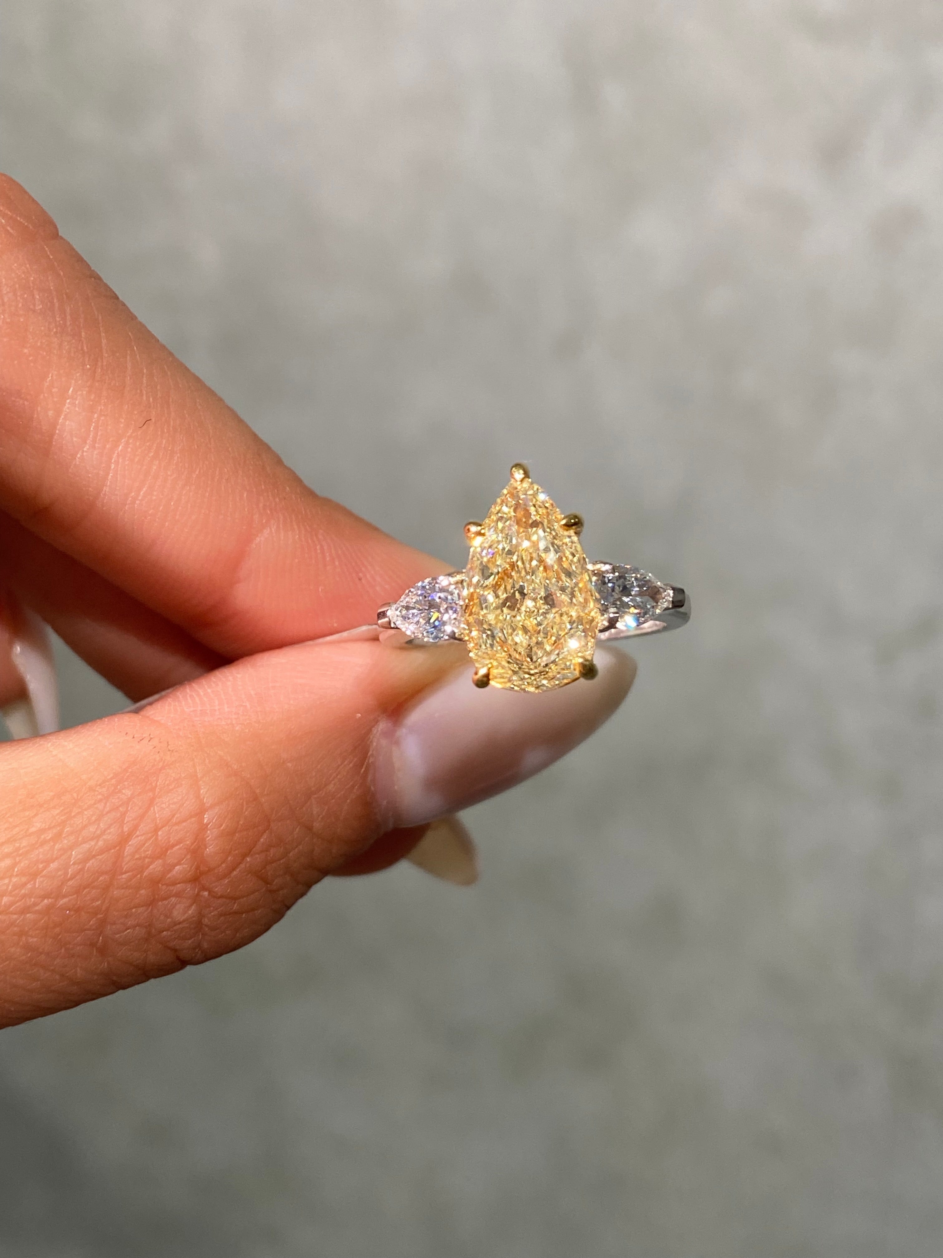 3.5ct GIA Light Yellow Pear Diamond Three Stone Engagement Ring