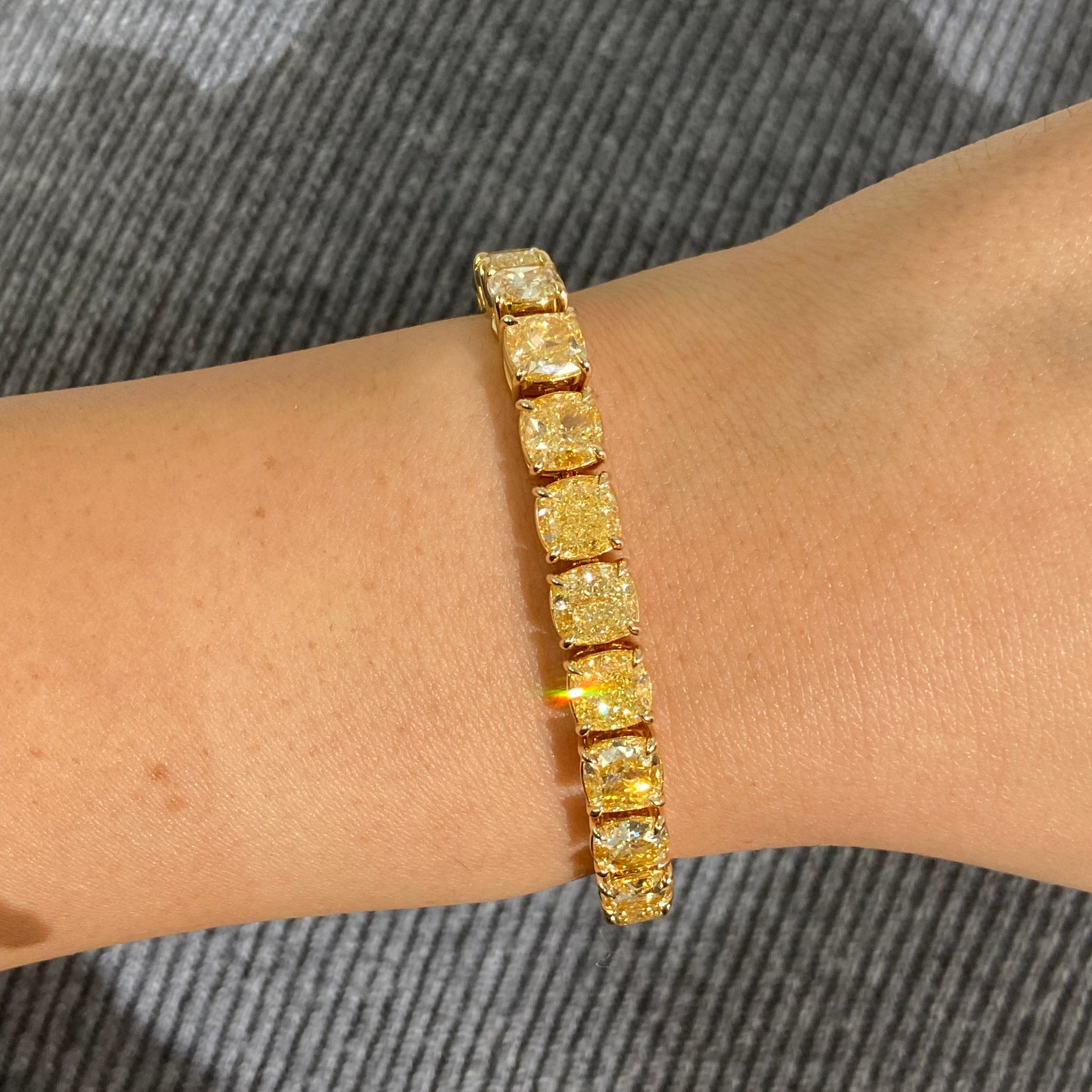 37.34ct Fancy Light Yellow Cushion diamond tennis bracelet, handcrafted by Rare Colors by Namdar