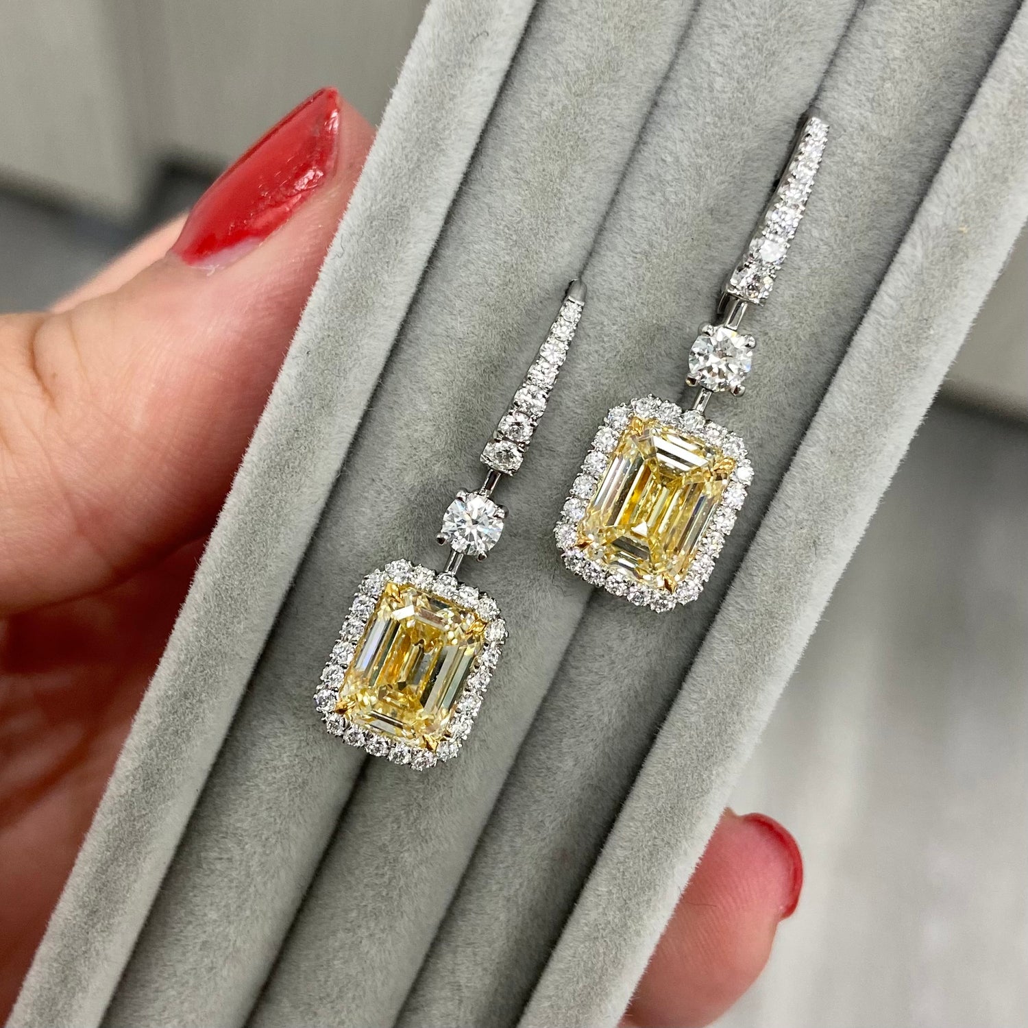 Yellow diamond studs. Yellow diamond earrings. Cushion cut diamond earrings. Yellow diamond earrings. Canary yellow diamond earrings. yellow diamond emerald cut.