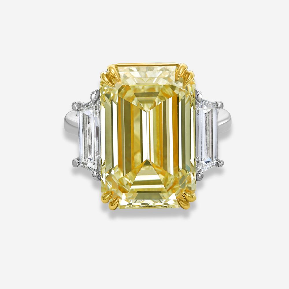 10 carat yellow diamond emerald cut set in ring 