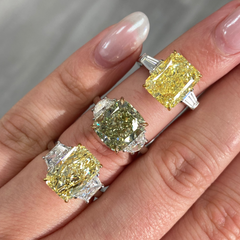 Luxurious yellow elongated radiant diamond engagement ring with a stunning hue with a VVS2 clarity.