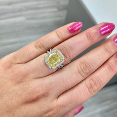 9 carat yellow diamond ring. Diamond ring set with a halo. Yellow diamond engagement ring. Yellow diamond wedding ring. Yellow diamond radiant. Yellow diamond ring.
