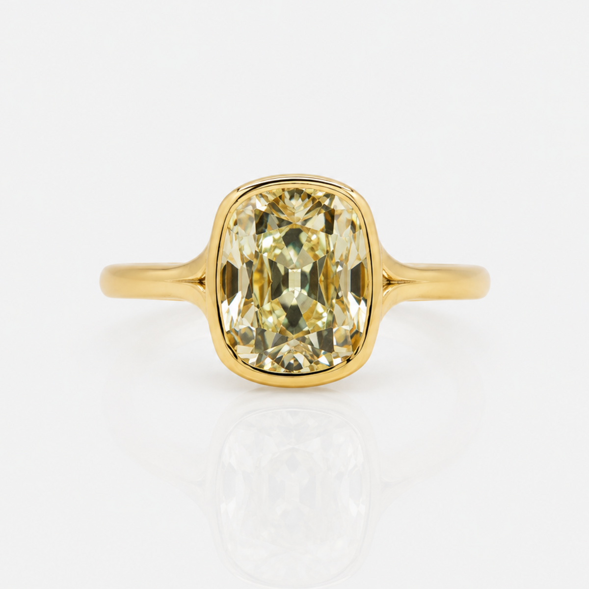 2.7ct light yellow old mine cushion diamond split shank bezel solitaire engagement ring | Rare Colors by Namdar, NYC