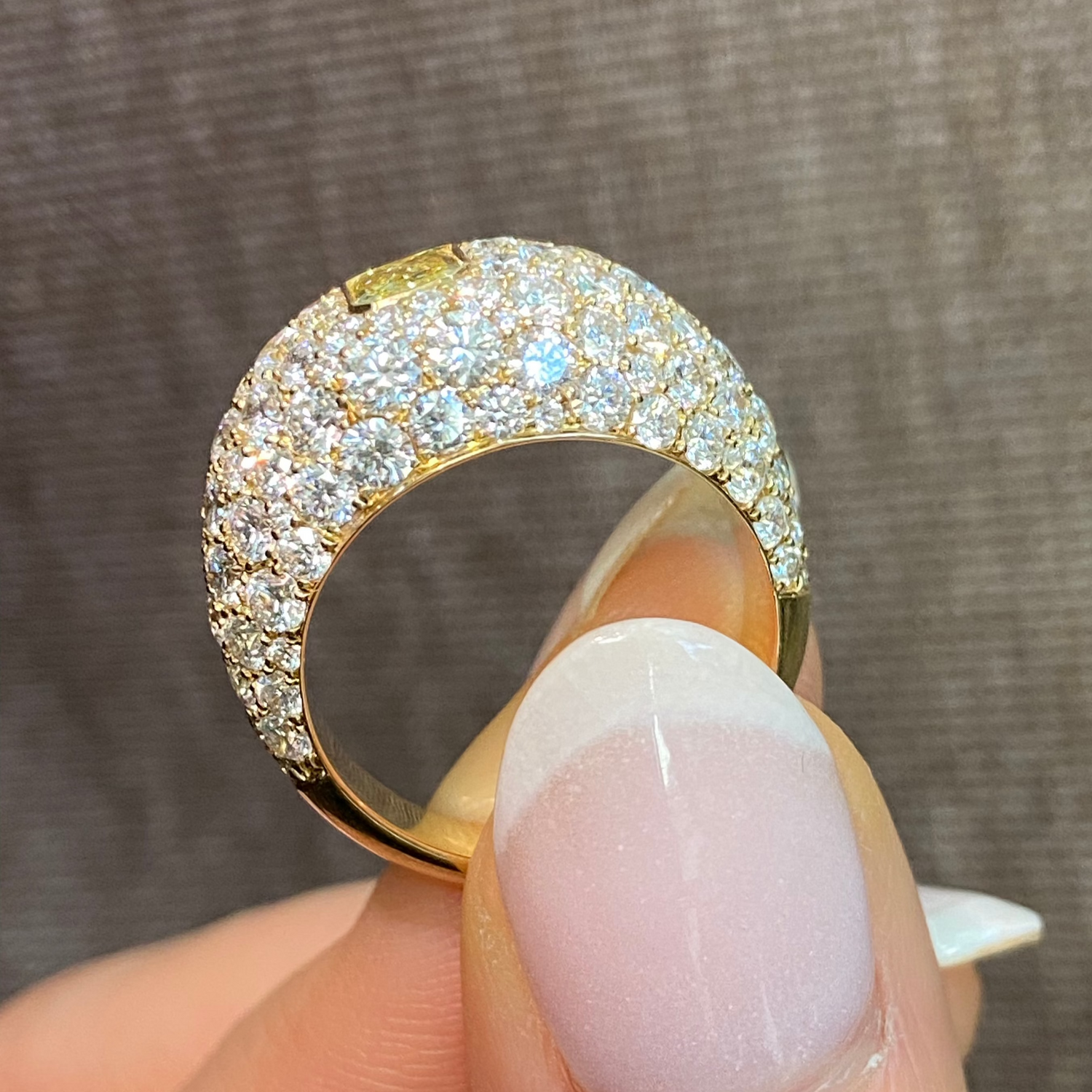Rare Colors by Namdar Fancy Intense Yellow Radiant diamond ring, New York City