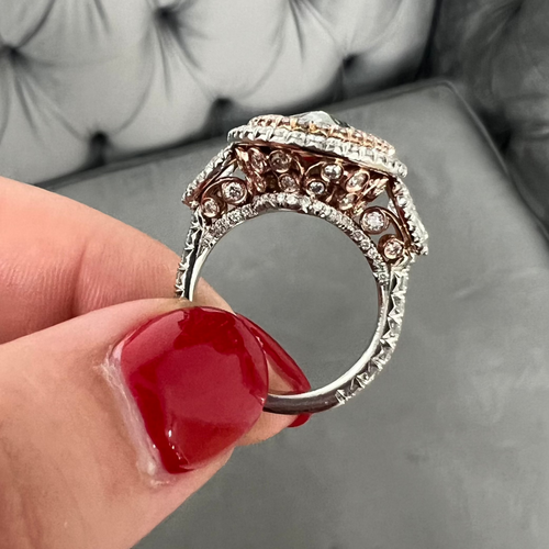 Unique green marquise cut diamond ring featuring a GIA certified diamond.