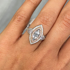 Fancy blue elongated diamond ring. blue marquis diamond. light blue diamond.