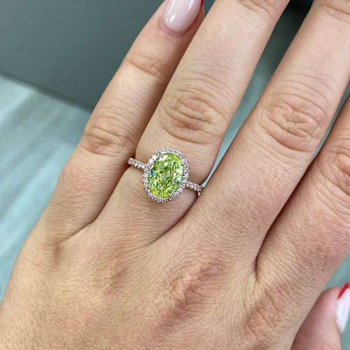 oval cut diamond, natural green diamond, unique green diamond engagement ring in pink diamond halo