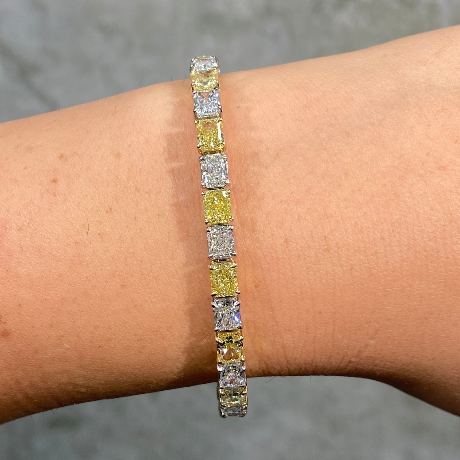 17 Carat Alternating Yellow and Colorless East West Radiant Diamond Bracelet