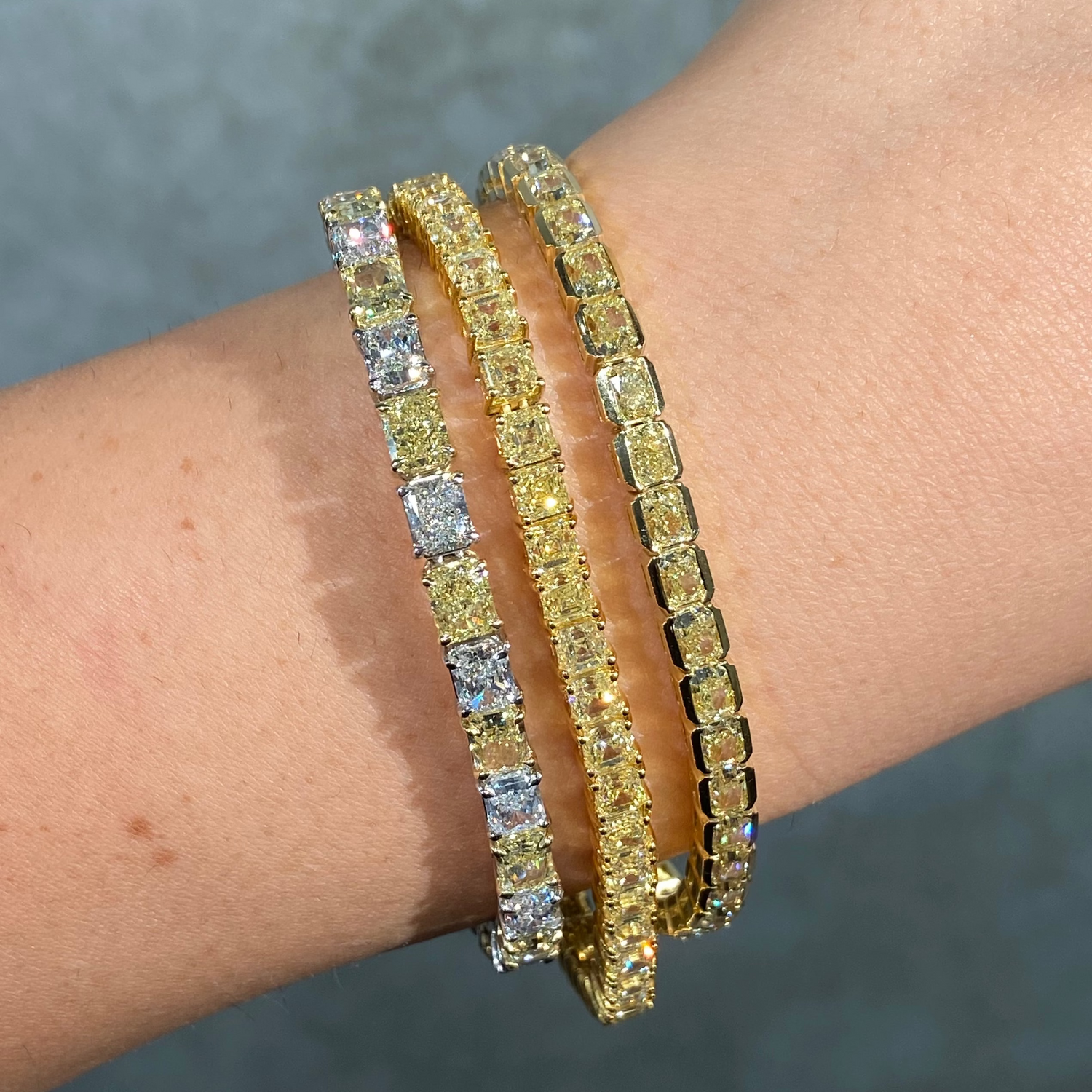 17ct Fancy Yellow Asscher bracelet — color diamond specialists Rare Colors by Namdar