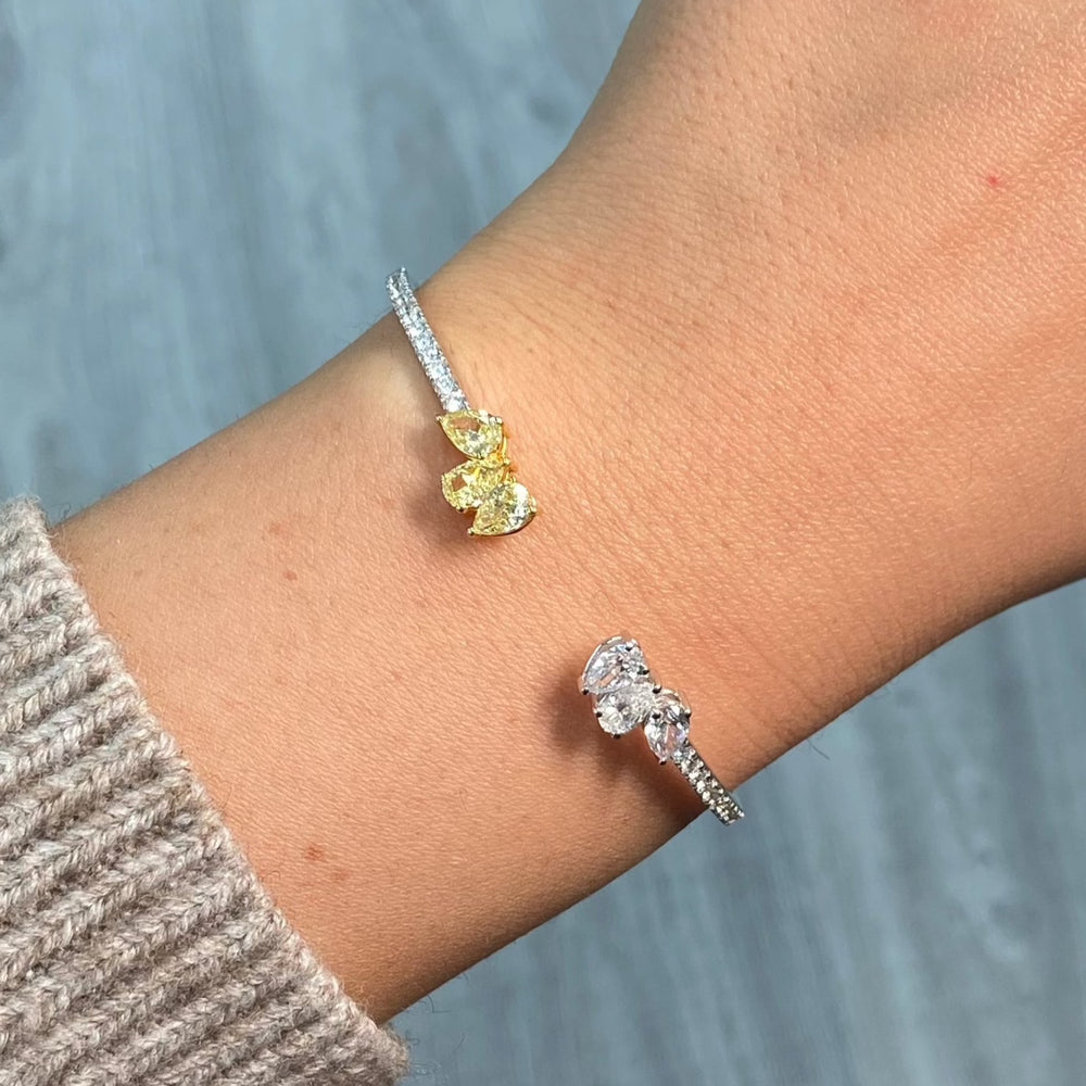 yellow and white diamond bangle with all natural diamonds and pave on the band
