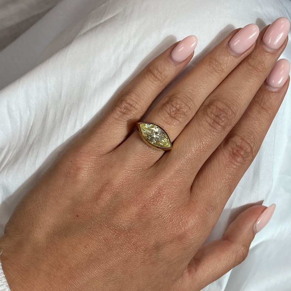 3.39ct Fancy Yellow Marquise Diamond East West Bezel Ring