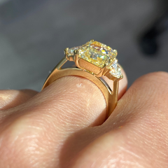 6.03ct Light Yellow Elongated Radiant Diamond Three Stone Ring