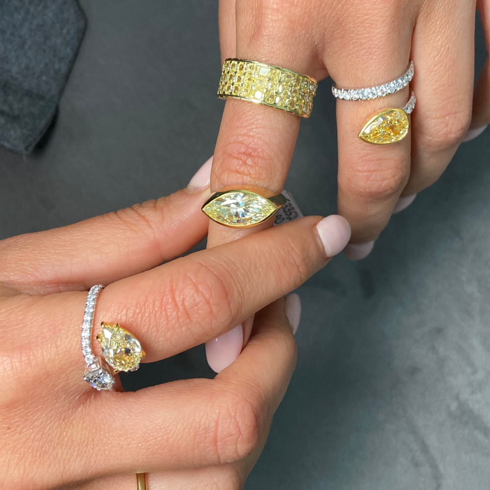 3.39ct Fancy Yellow Marquise Diamond East West Bezel Ring