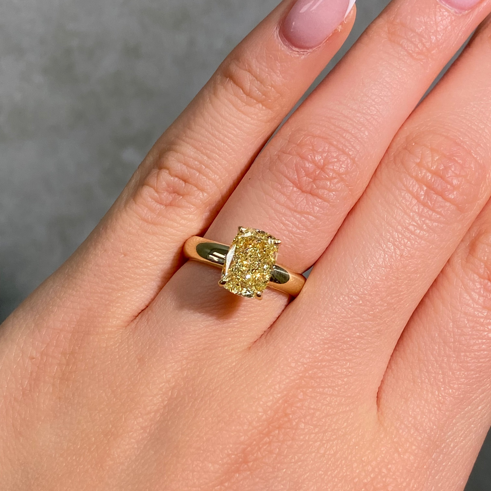 GIA 3ct Fancy Yellow Cushion diamond solitaire at Rare Colors by Namdar, 5th Avenue New York