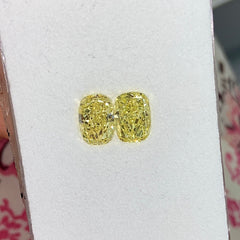 1.84ct and 1.80ct Fancy Intense Yellow Elongated Cushion Cut Diamonds