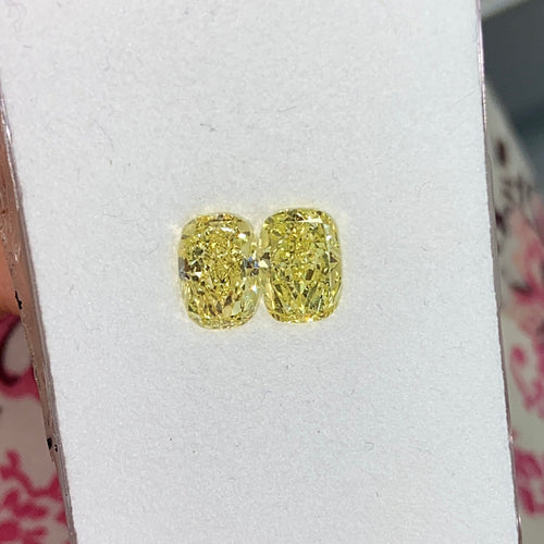 1.84ct and 1.80ct Fancy Intense Yellow Elongated Cushion Cut Diamonds