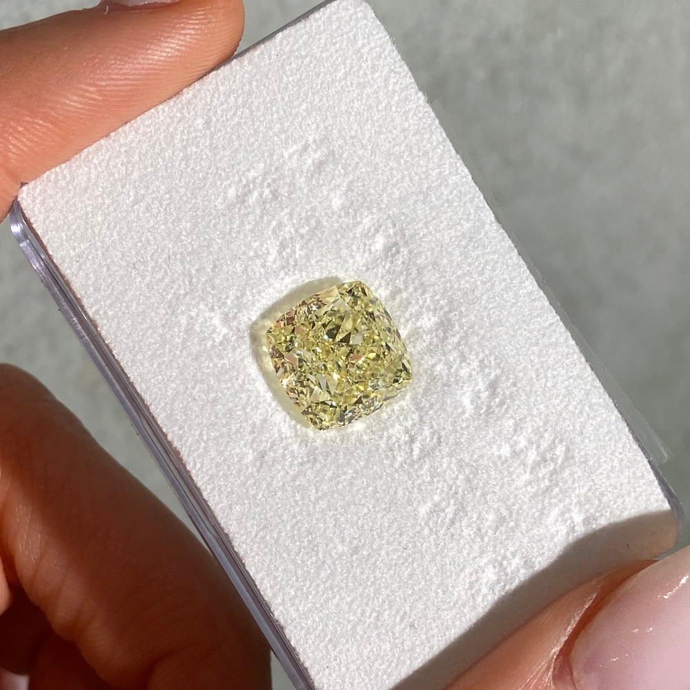 7.68 Carat Fancy Yellow Cushion Cut Diamond