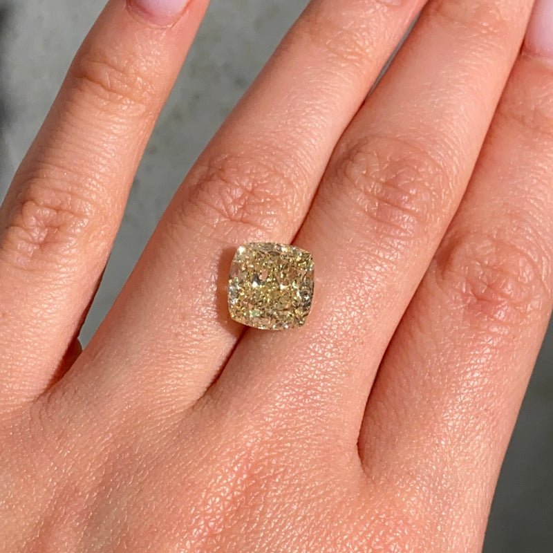 7.68 Carat Fancy Yellow Cushion Cut Diamond