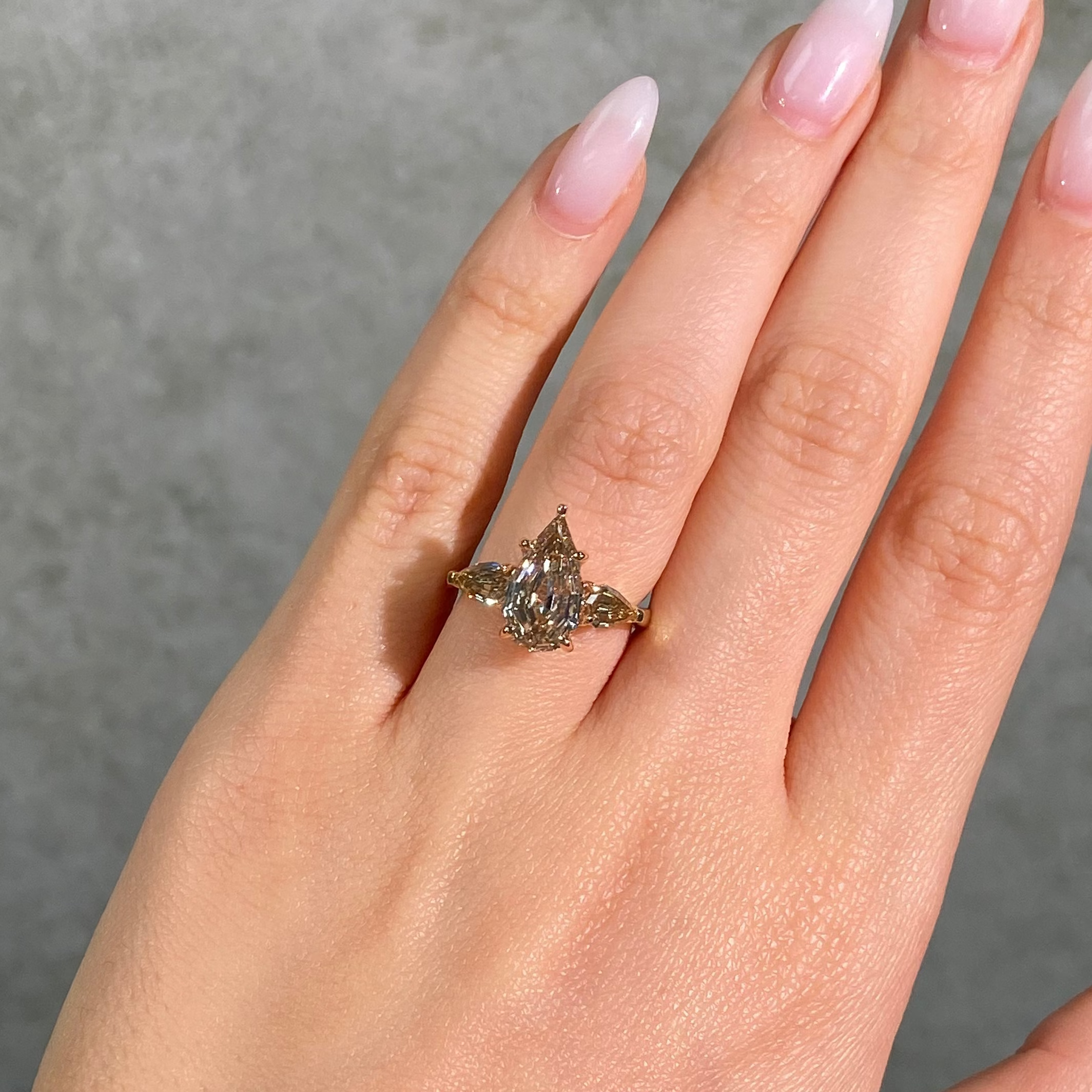 Champagne Pear Diamond Three Stone Engagement Ring