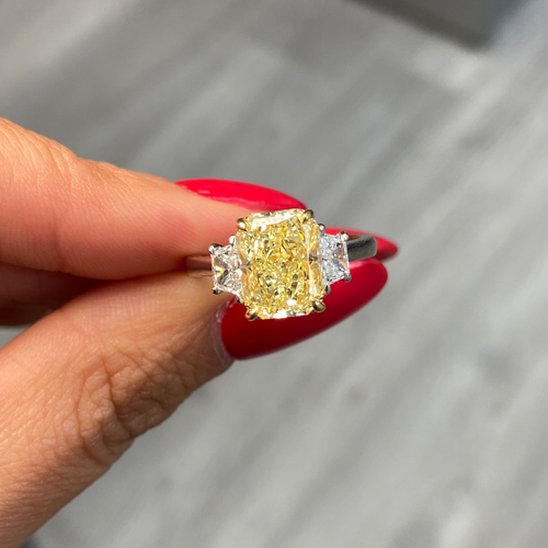 3 Carat Fancy Yellow Elongated Radiant Diamond Three Stone Ring