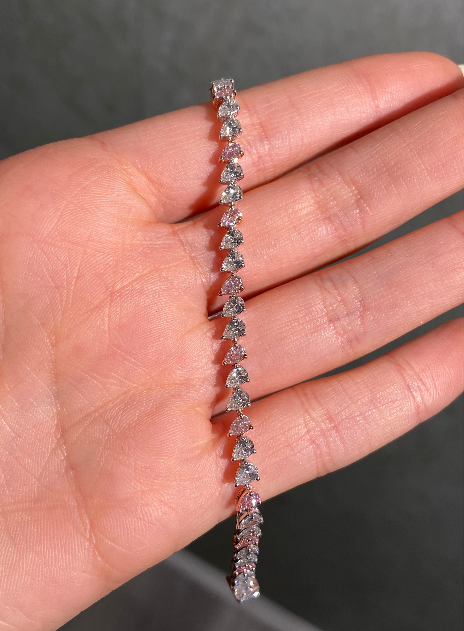 5.7ct Pink Pear diamond tennis bracelet, handcrafted by Rare Colors by Namdar