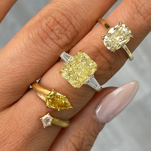 5.52ct Fancy Yellow Elongated Radiant Diamond Three Stone Ring